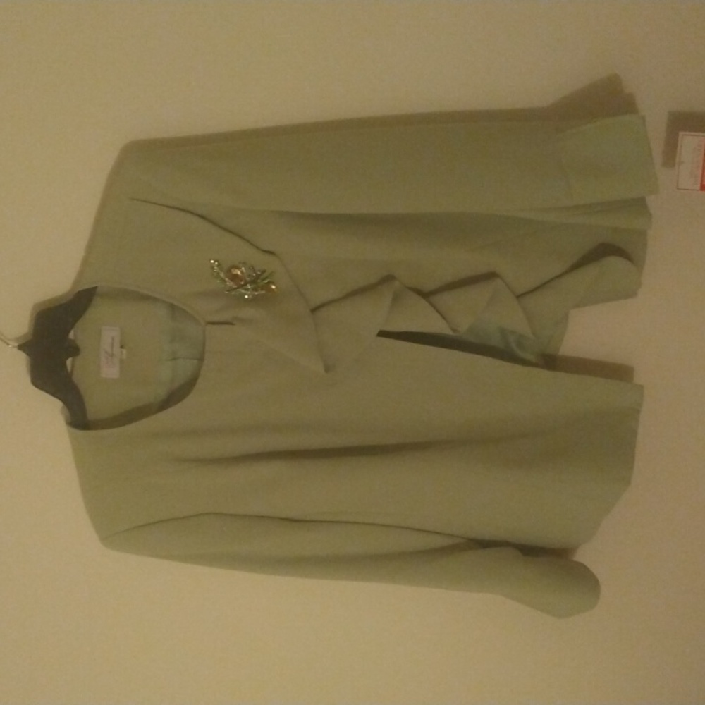 Beautiful avocado green blazer adorned with gorgeous broche